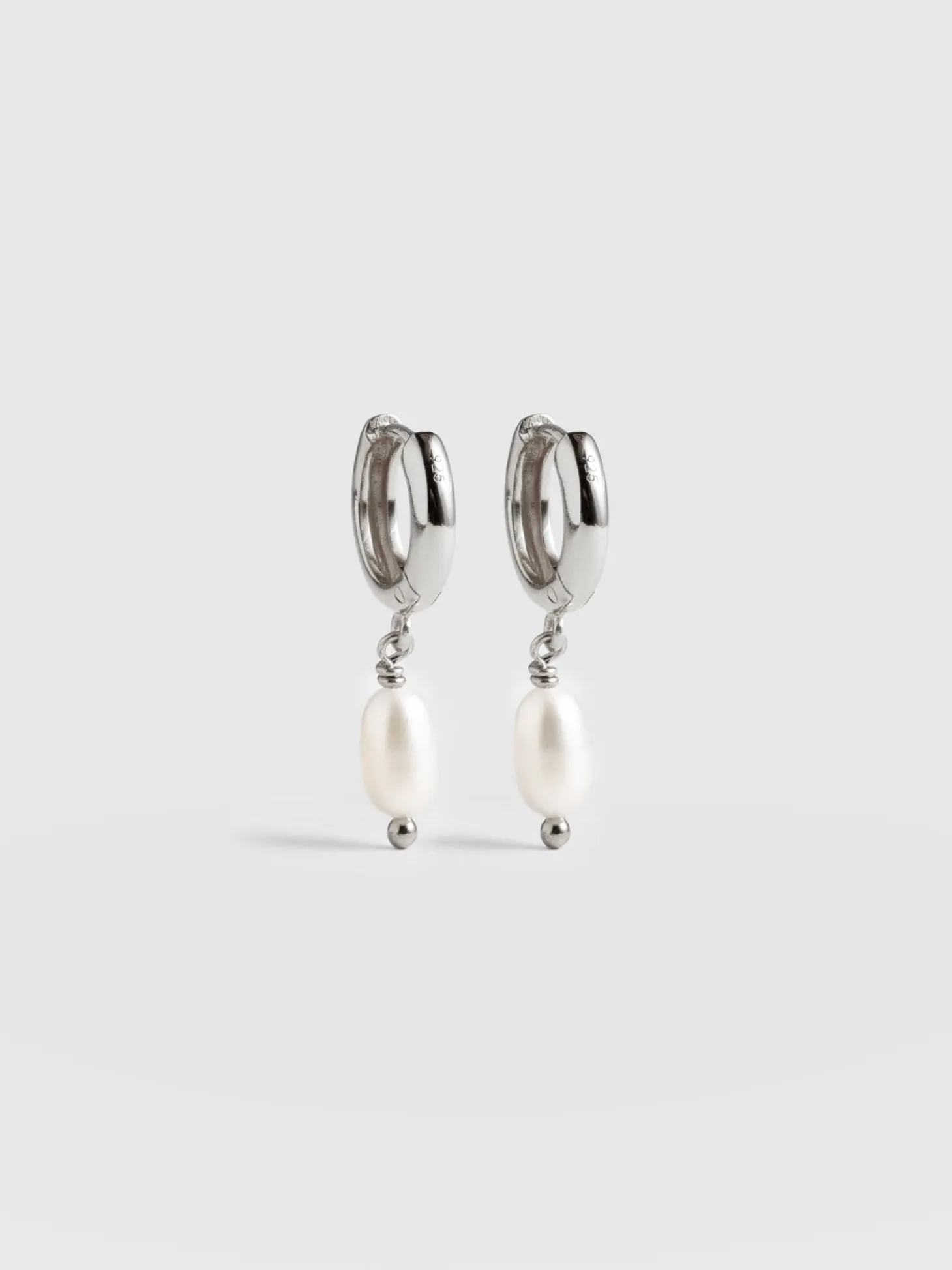 Jacqueline Pearl Huggie Earrings - Silver