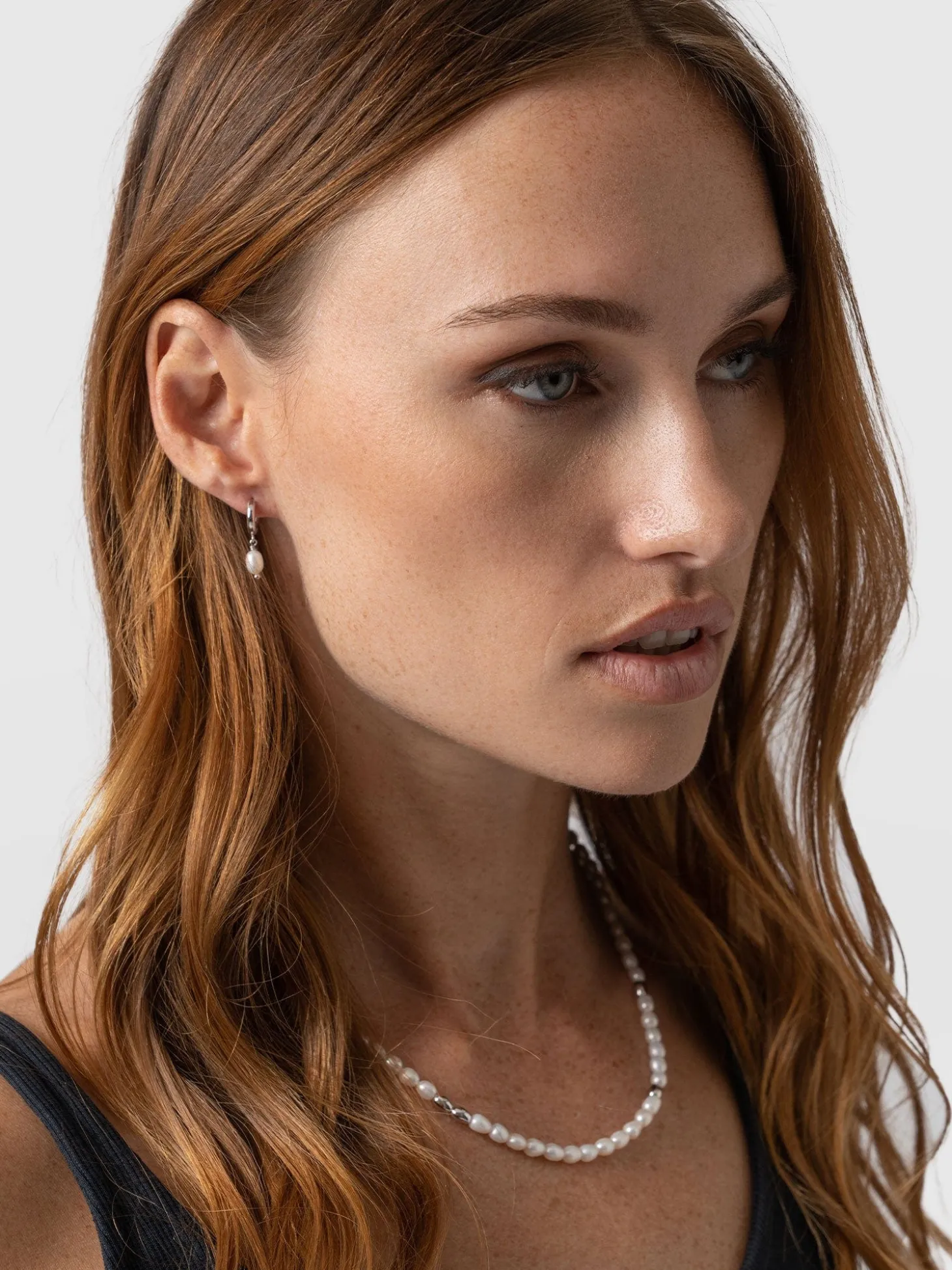 Jacqueline Pearl Huggie Earrings - Silver